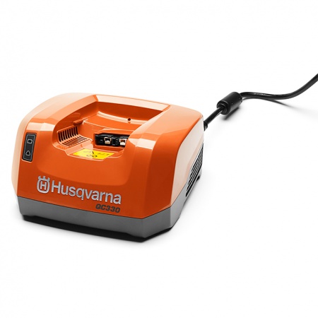 Chargeur de batterie Husqvarna QC330 de face orange